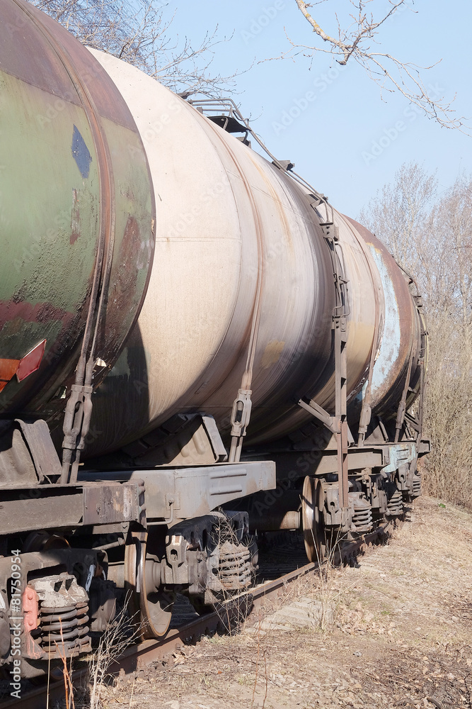 Naklejka premium Tanks with fuel being transported by rail