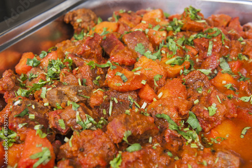 Beef vindaloo curry at an indian restaurant buffet