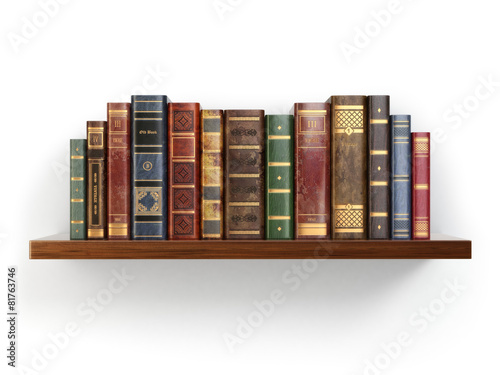 Vintage old books on shelf isolated on white.