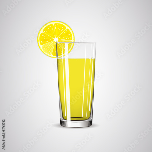Glass with lemonade / lemon juice and lemon slice.