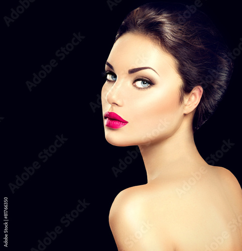 Beauty woman face closeup isolated on black background © Subbotina Anna