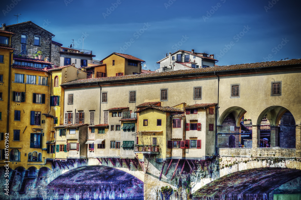 historic buildings over Arno river