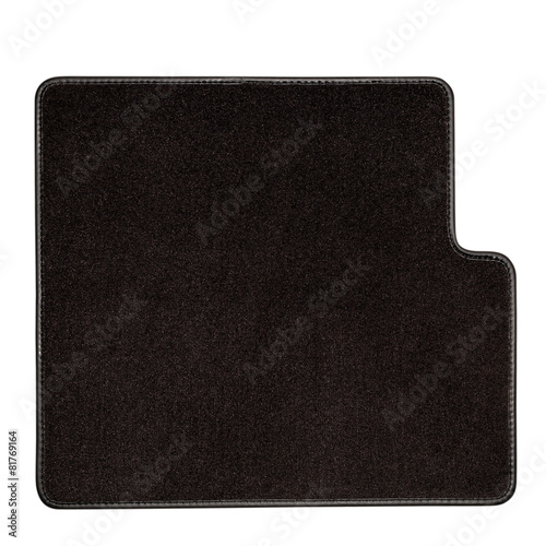 Car mat on white. Interior detail.