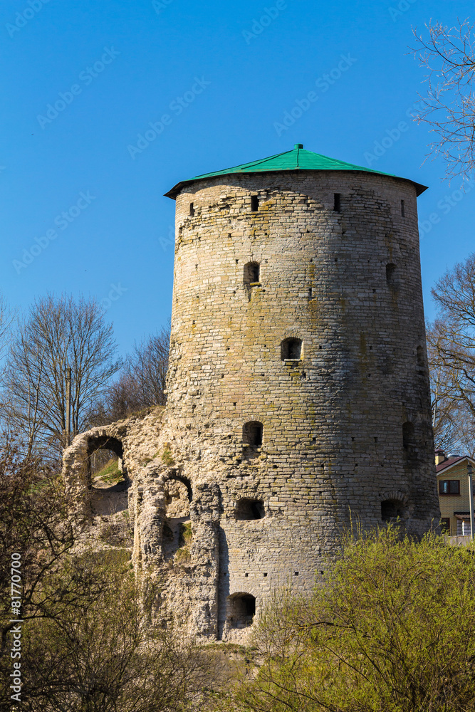 Ancient tower on blue sky background