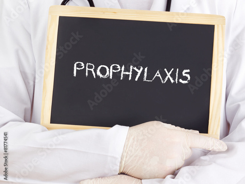 Doctor shows information on blackboard: prophylaxis