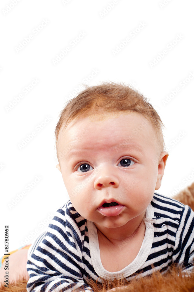 Portrait of cute baby boy lying on fur Portrait of cute baby boy lying on fur