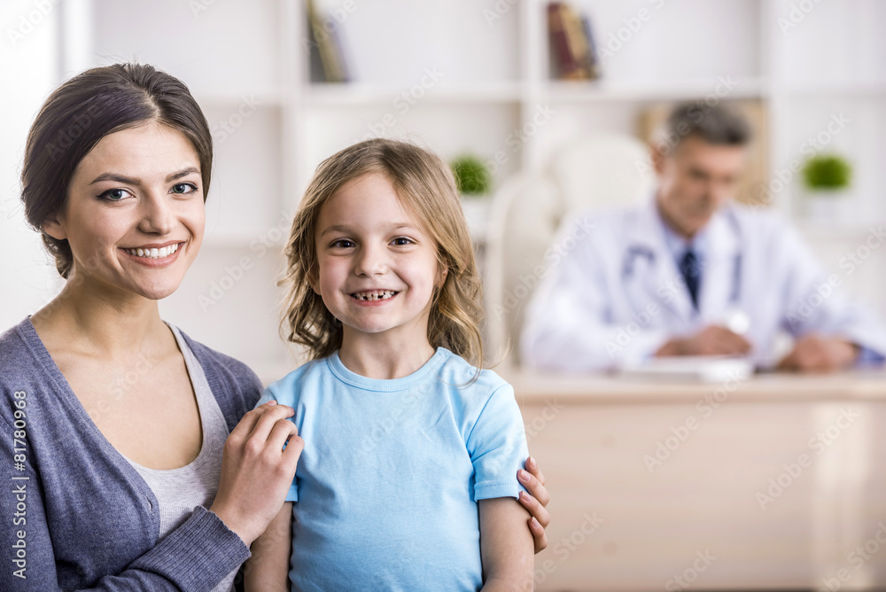 Mom with kid at the doctor.