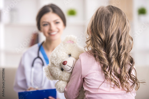 Little girl in a doctor