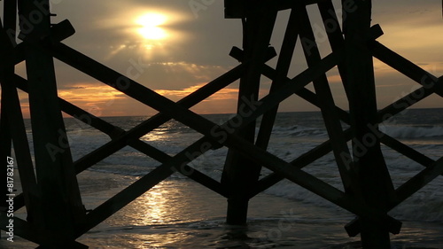 Beach morning under the pier