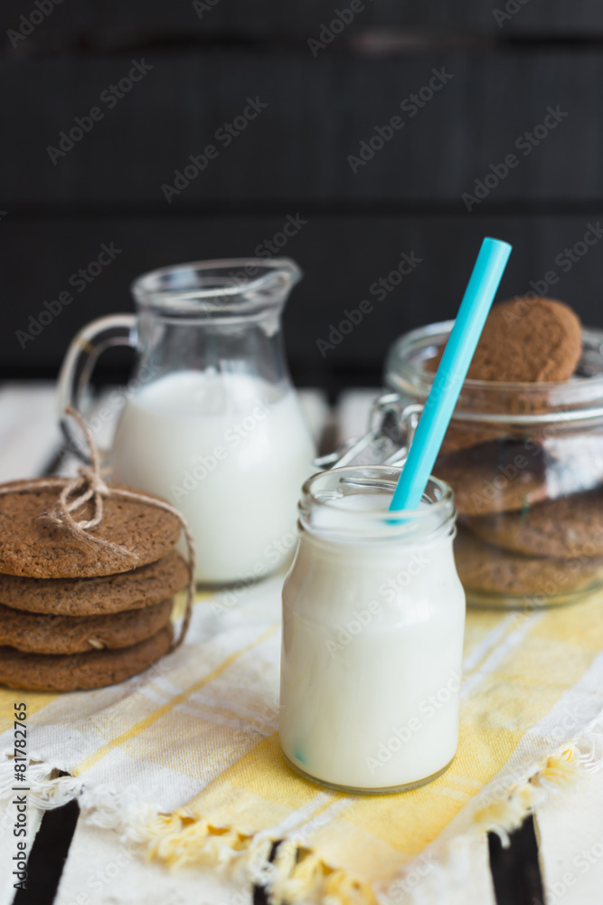 Rustic home made cookies on the wooden background with milk Rustic home made cookies on the wooden background with milk