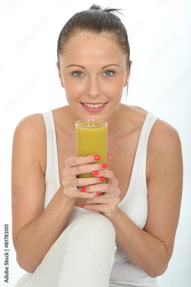 Young Woman Holding a Glass of Lime and Mango smoothie Young Woman Holding a Glass of Lime and Mango smoothie