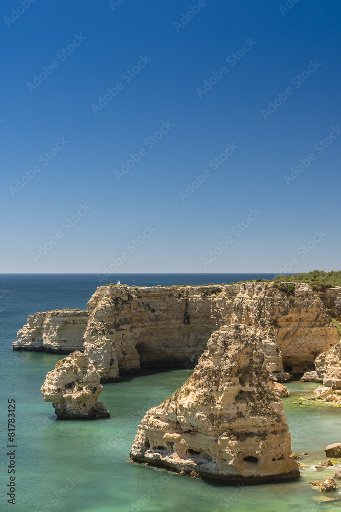 View of the cliffs on the coast of the Algarve in Portugal.