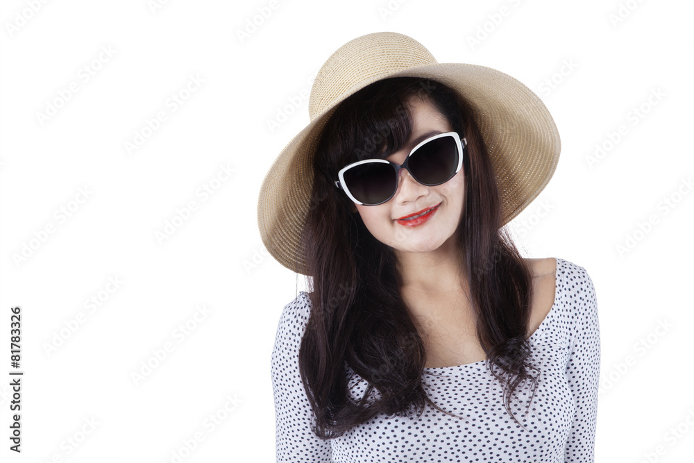 Fototapeta premium Woman wearing a hat in studio