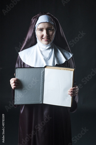 Nun with book