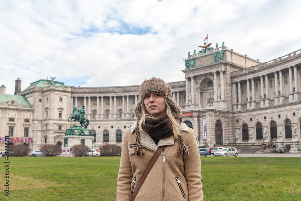 The girl on the background of the Hofburg Palace, Vienna