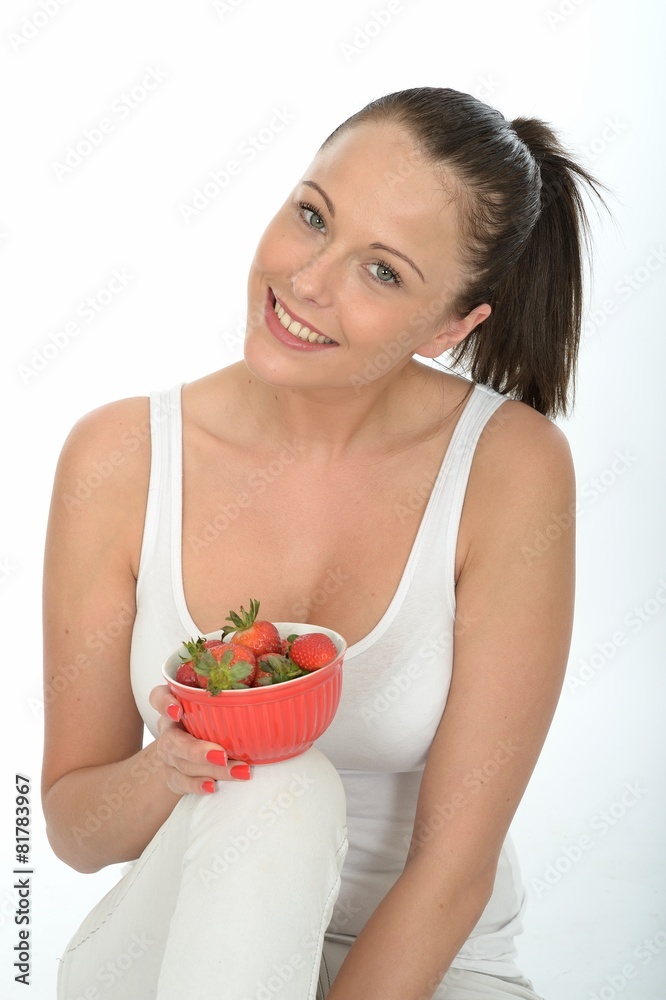 Young Woman Holding a Bowl of Fresh Ripe Juicy Strawberries