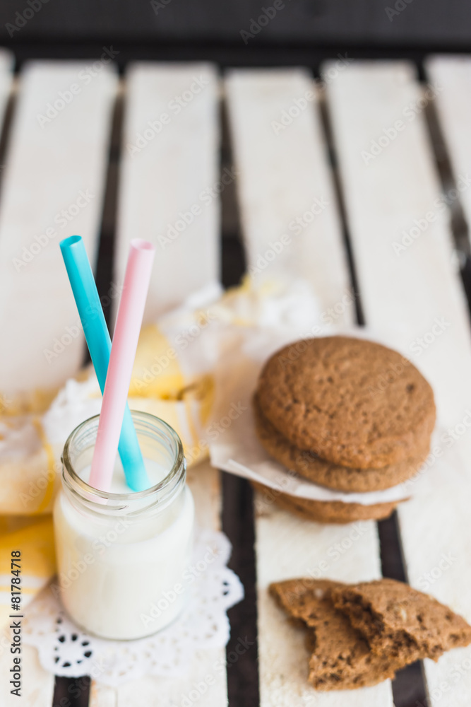 Rustic home made cookies on the wooden background with milk Rustic home made cookies on the wooden background with milk