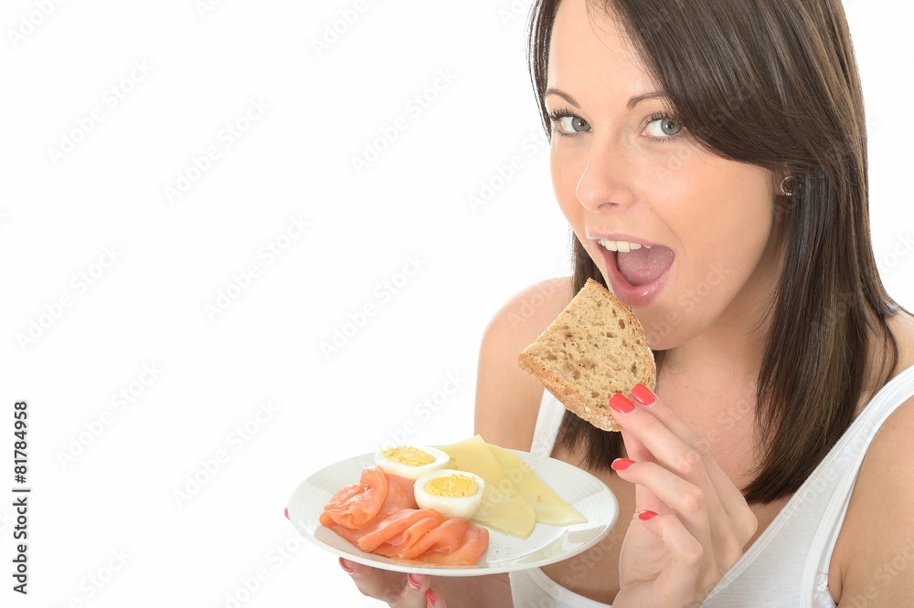 Young Woman Holding a Plate of Norwegian Style Breakfast