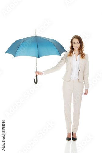 Businesswoman holding an umbrella.