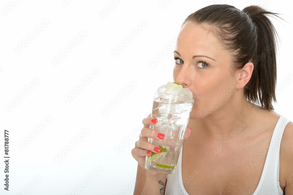 Healthy Attractive Young Woman Holding a Glass of Iced Water Healthy Attractive Young Woman Holding a Glass of Iced Water