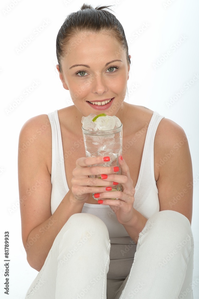 Healthy Attractive Young Woman Holding a Glass of Iced Water Healthy Attractive Young Woman Holding a Glass of Iced Water
