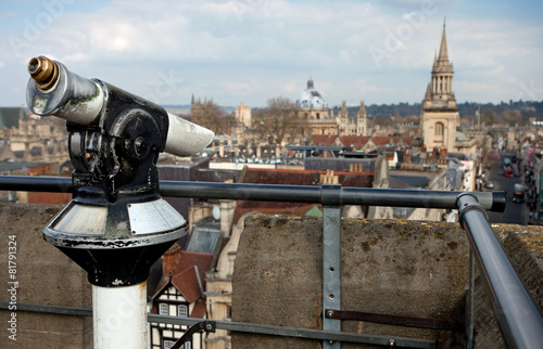 Coin operated binoculars with Oxford in the background