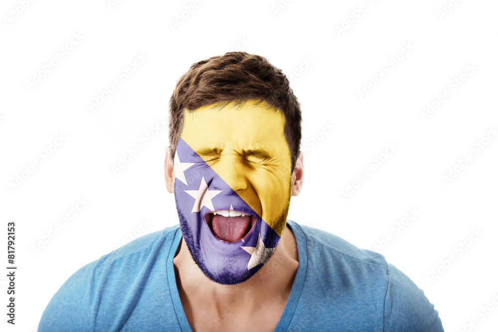 Man with Bosnia and Herzegovina flag on face. Man with Bosnia and Herzegovina flag on face.