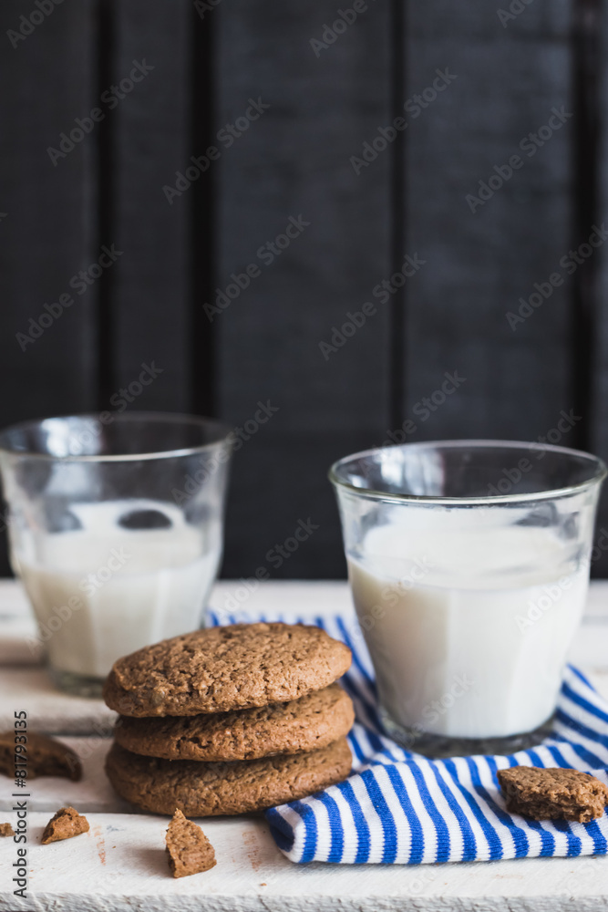 Rustic home made cookies on the wooden background with milk Rustic home made cookies on the wooden background with milk