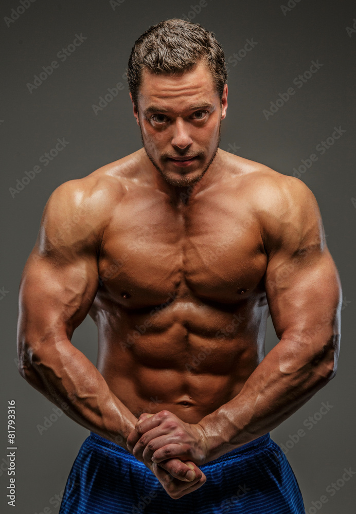 Muscular man posing in studio