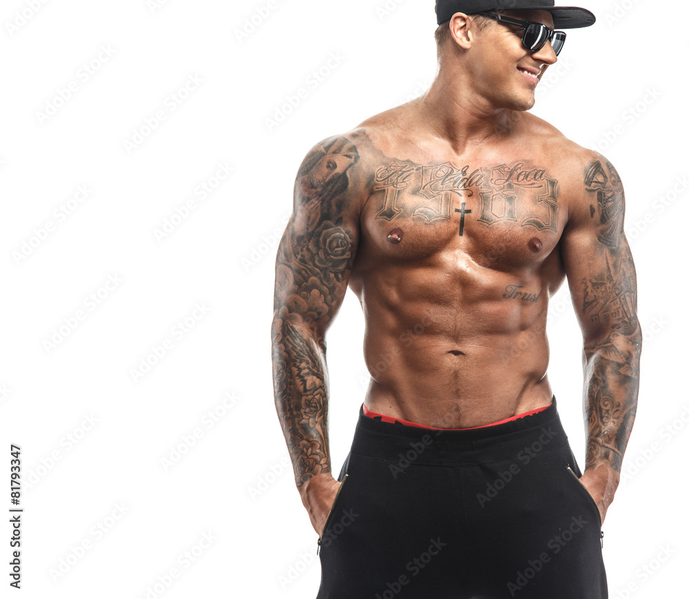 Brutal male with tattooed torso Brutal male with tattooed torso
