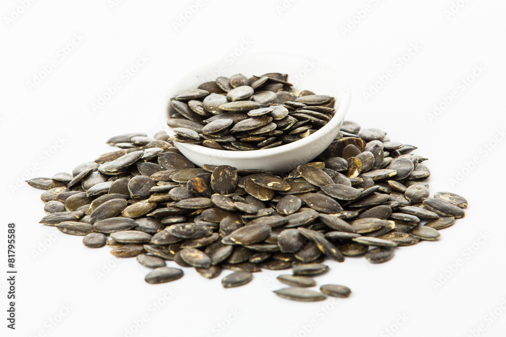 pumpkin seeds isolated on white background. Fresh roasted Pumpki pumpkin seeds isolated on white background. Fresh roasted Pumpki