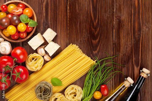 Italian food cooking ingredients. Pasta, tomatoes, basil