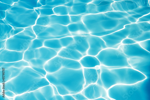 Bright water surface in swimming pool