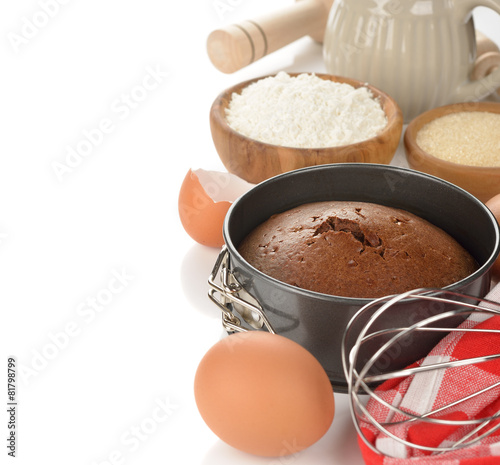 Chocolate cake and ingredients for baking