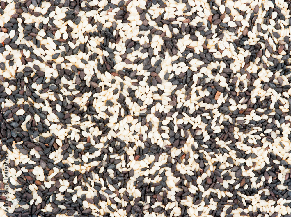 black and white sesame seeds isolated on white background black and white sesame seeds isolated on white background