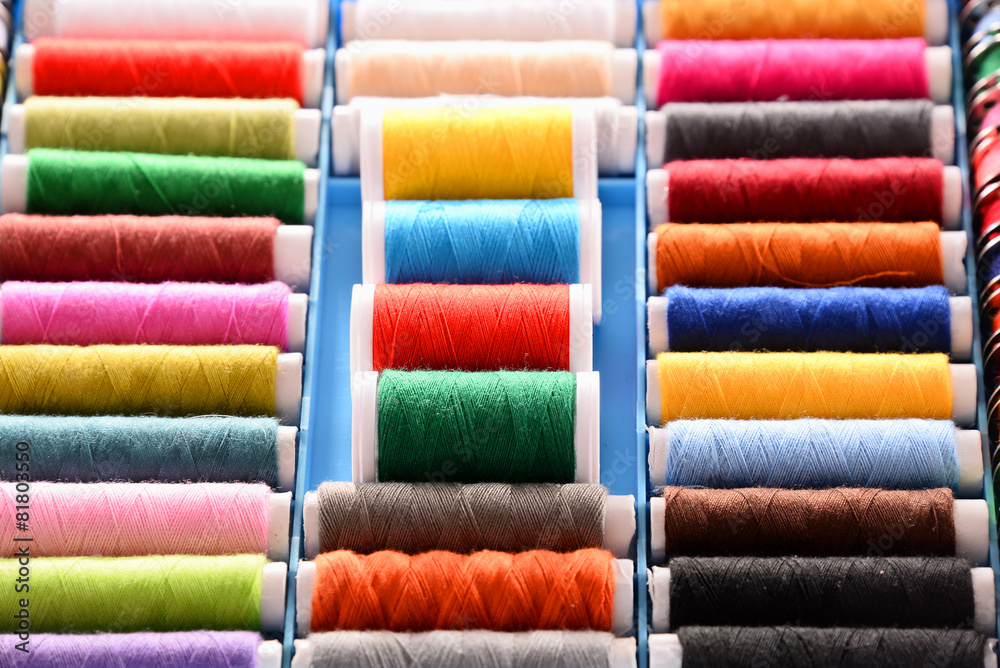 Composition with tailor threads in a box Composition with tailor threads in a box