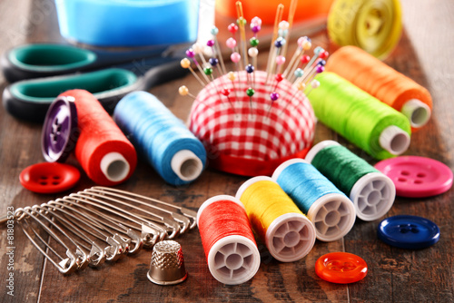 Composition with tailor accessories on wooden table