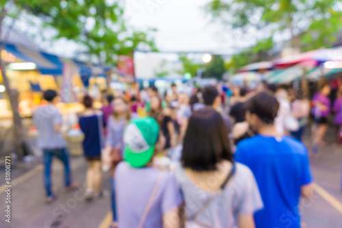 Blur of tourists are walking and shopping in Chatuchak market