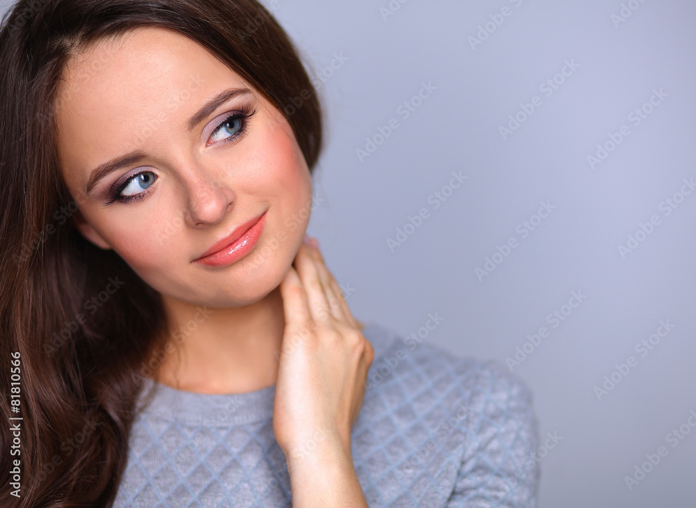 Portrait of an attractive fashionable young brunette woman Portrait of an attractive fashionable young brunette woman