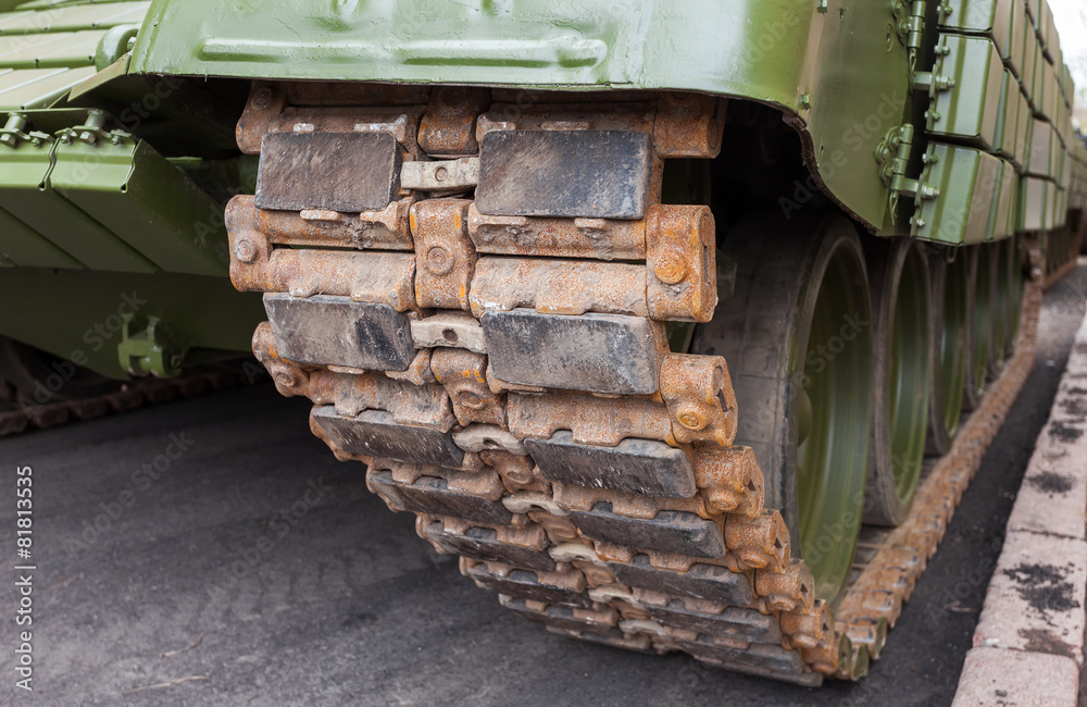 Caterpillars of a military tank close up detail