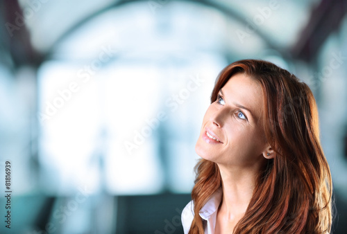 Portrait of a thoughtful businesswoman looking