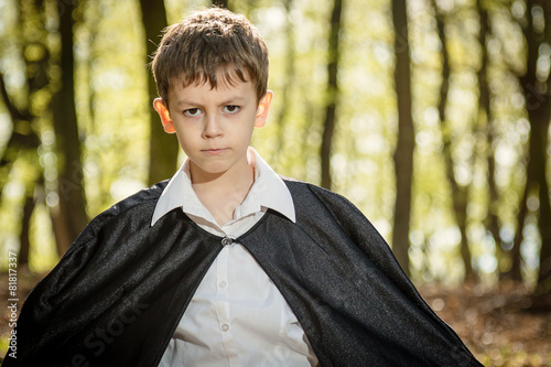 boy with black cape