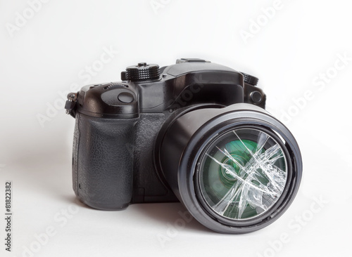 Принти на полотні Digital reflex camera with the front lens broken.
