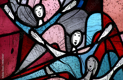 Singing angels in stained glass