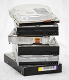 Old hard disk drives in a pile