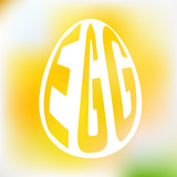Silhouette of egg with text inside on blur background