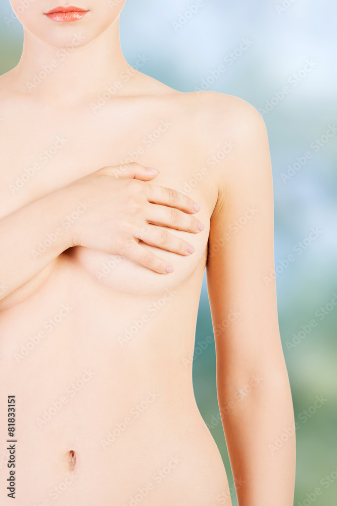 Obraz premium Woman examining breast.