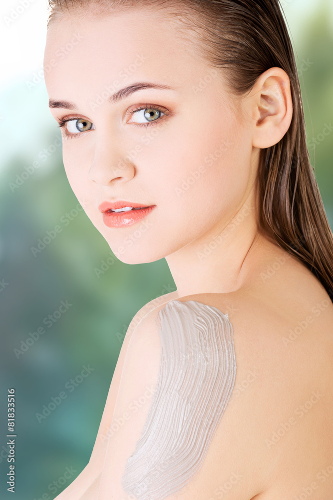 Woman with clay on arm. Woman with clay on arm.