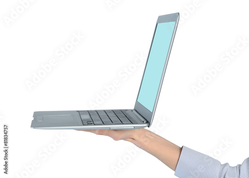 Woman hand holding  laptop