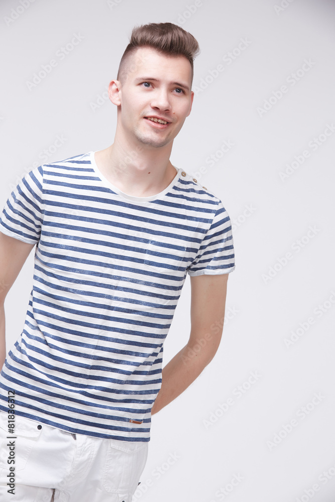young guy in a striped sweater like a sailor